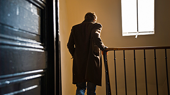 person walking up steps