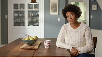 woman sitting at a table