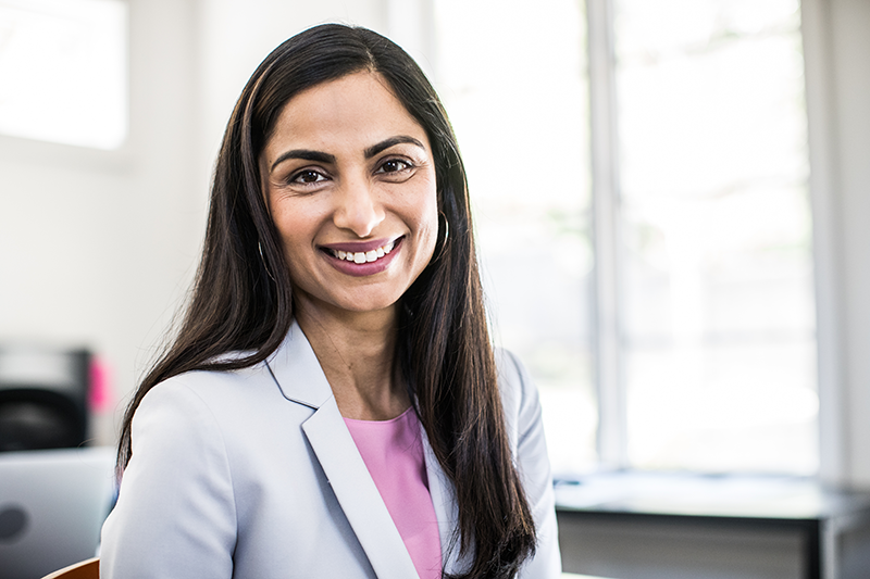 woman looking at camera and smiling