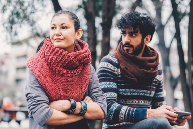 Couple sitting outside