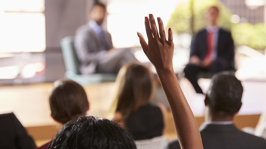 Hand raised in meeting